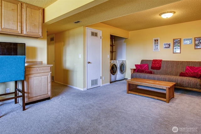 2120 Niagara Dr, Bellingham, WA 98229 - carpeted living area with separate washer and dryer and a textured ceiling