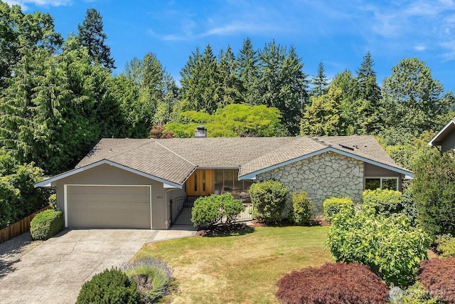 1823 121st Ave SE, Bellevue, WA 98005 - view of front of property with an attached garage, a front yard, a chimney, driveway, and a shingled roof