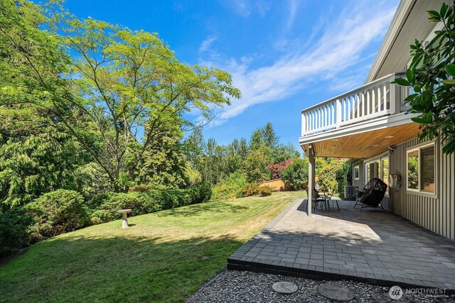1823 121st Ave SE, Bellevue, WA 98005 - view of green lawn with a patio area