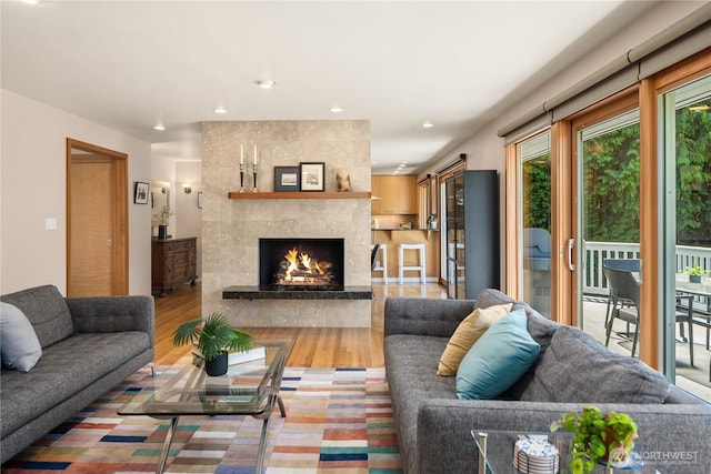 1823 121st Ave SE, Bellevue, WA 98005 - living area with wood finished floors, a fireplace, and recessed lighting