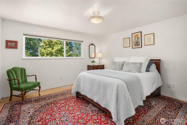 1823 121st Ave SE, Bellevue, WA 98005 - bedroom with baseboards and wood finished floors
