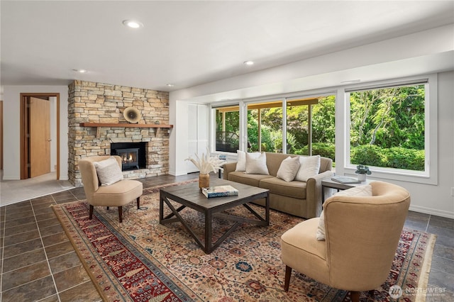 1823 121st Ave SE, Bellevue, WA 98005 - living room with stone tile floors, a fireplace, and recessed lighting