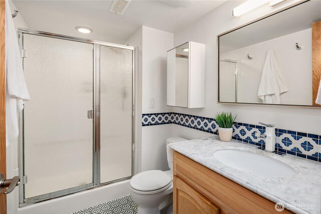 1823 121st Ave SE, Bellevue, WA 98005 - full bath with vanity, a stall shower, tile patterned flooring, and recessed lighting