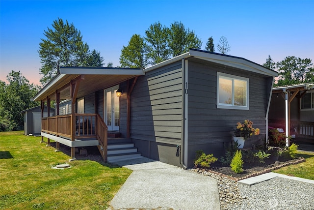 8730 206th St SE Unit 10, Snohomish, WA 98296 - manufactured / mobile home with a lawn and a porch