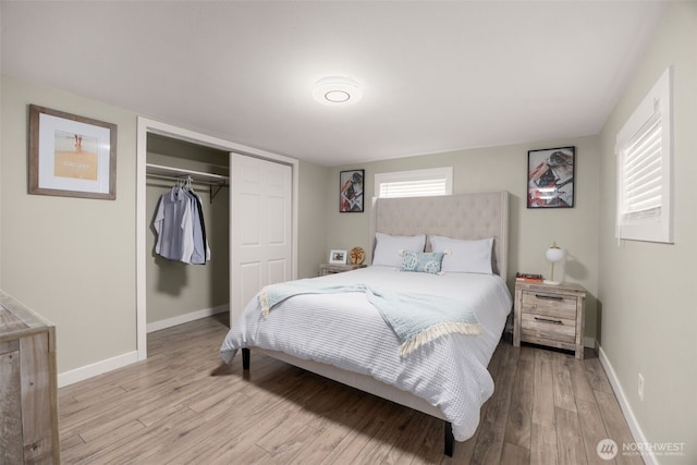 8730 206th St SE Unit 10, Snohomish, WA 98296 - bedroom featuring wood finished floors and a closet