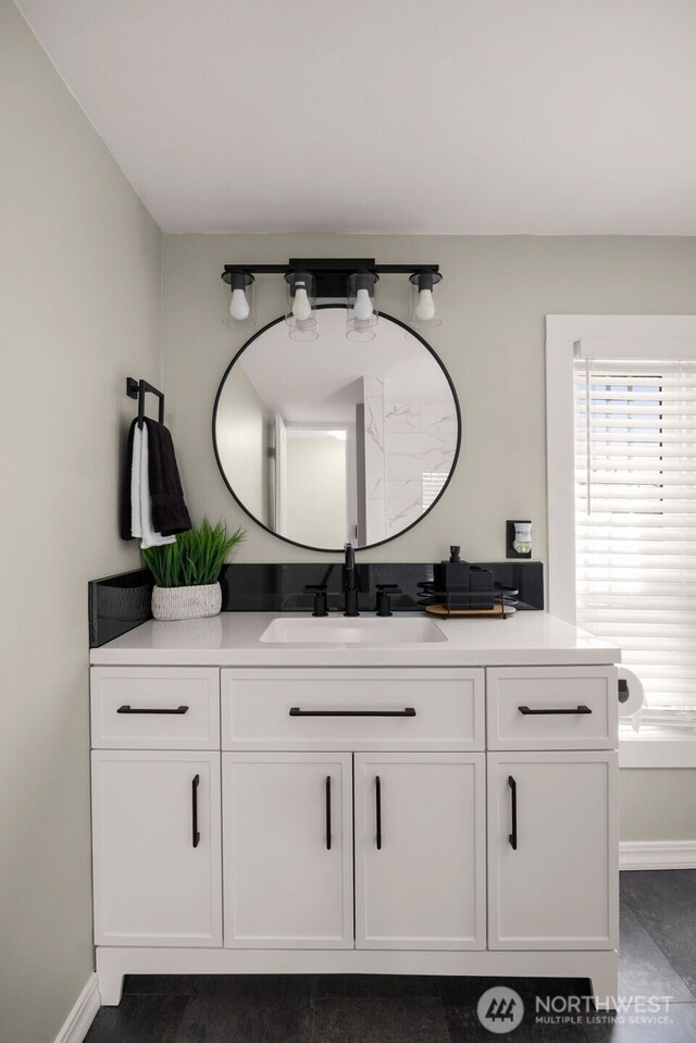8730 206th St SE Unit 10, Snohomish, WA 98296 - bathroom with vanity and baseboards