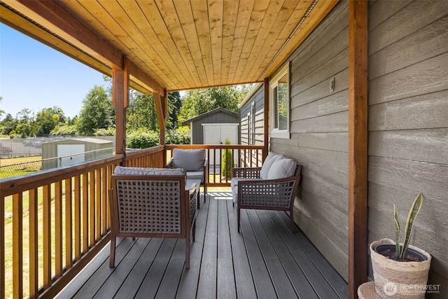 8730 206th St SE Unit 10, Snohomish, WA 98296 - wooden terrace with a shed