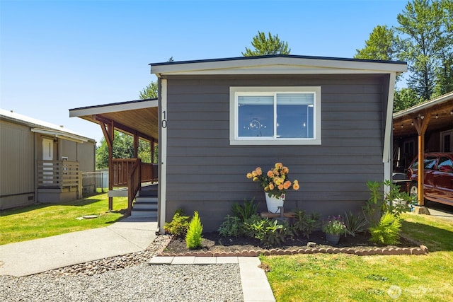 8730 206th St SE Unit 10, Snohomish, WA 98296 - view of front facade featuring a front lawn