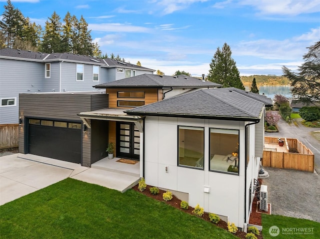 240 W Lake Sammamish Pkwy SE, Bellevue, WA 98008 - view of front of property with concrete driveway, an attached garage, roof with shingles, and stucco siding