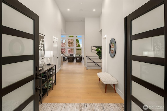 240 W Lake Sammamish Pkwy SE, Bellevue, WA 98008 - corridor with a high ceiling, wood finished floors, and recessed lighting
