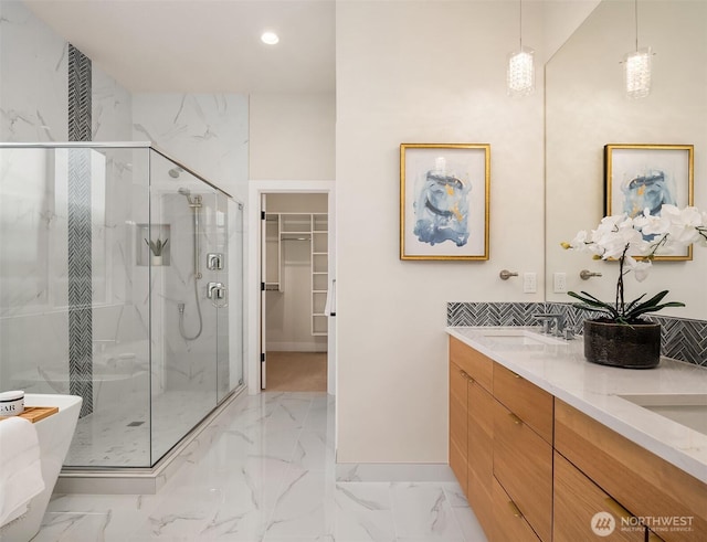 240 W Lake Sammamish Pkwy SE, Bellevue, WA 98008 - full bath with a stall shower, marble look tiles, double vanity, a spacious closet, and recessed lighting