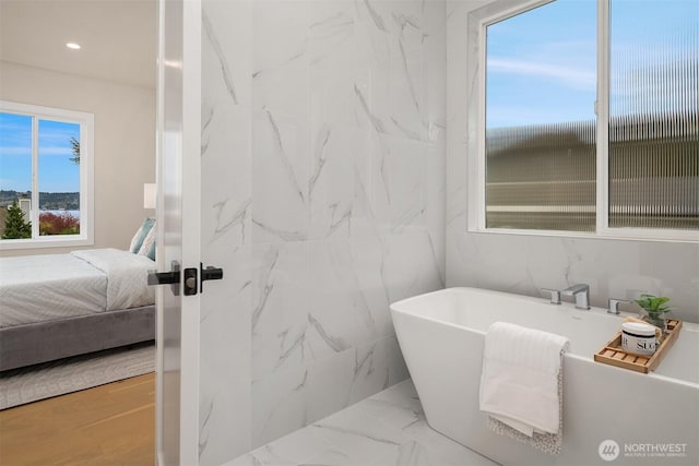 240 W Lake Sammamish Pkwy SE, Bellevue, WA 98008 - ensuite bathroom with a freestanding bath and recessed lighting