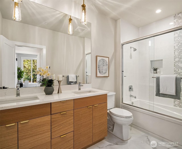 240 W Lake Sammamish Pkwy SE, Bellevue, WA 98008 - bathroom featuring marble look tile flooring, double vanity, enclosed tub / shower combo, and recessed lighting