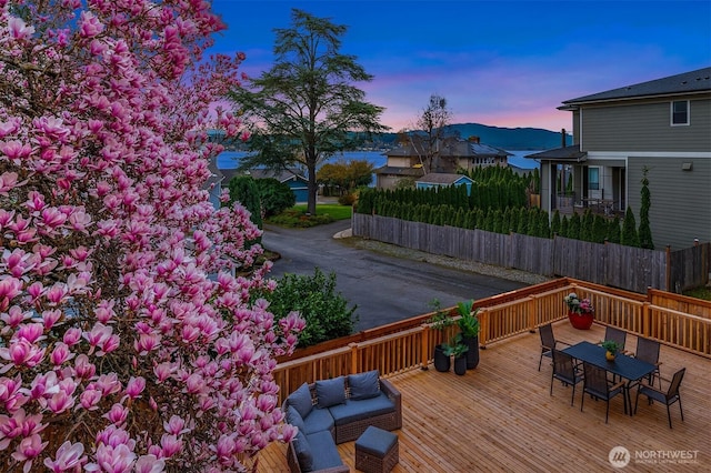240 W Lake Sammamish Pkwy SE, Bellevue, WA 98008 - deck at dusk with outdoor dining space