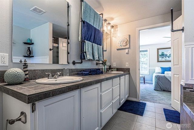 18920 217th Ave E, Orting, WA 98360 - ensuite bathroom with double vanity and tile patterned floors