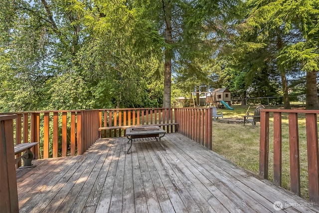 610 Westlake Ave, Morton, WA 98356 - deck featuring a playground and view of scattered trees