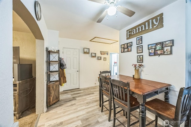 610 Westlake Ave, Morton, WA 98356 - dining space with a ceiling fan, light wood-type flooring, and arched walkways