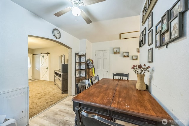 610 Westlake Ave, Morton, WA 98356 - dining area featuring arched walkways, a ceiling fan, and light wood finished floors