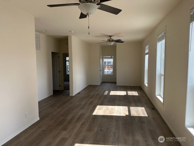 2101 S 324th St Unit 228, Federal Way, WA 98003 - empty room with a ceiling fan and wood finished floors