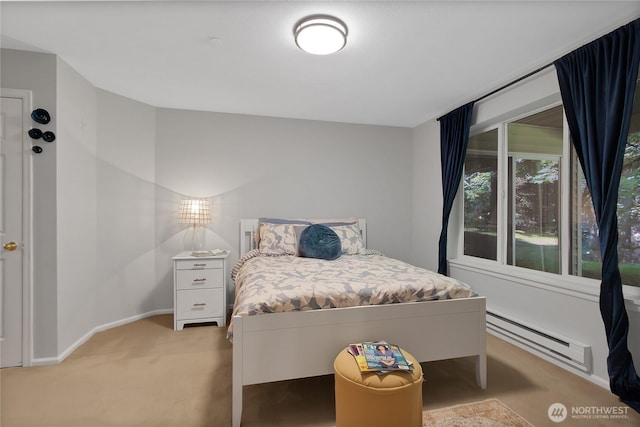 2300 Jefferson Ave NE Unit F-126, Renton, WA 98056 - bedroom featuring a baseboard radiator and light colored carpet