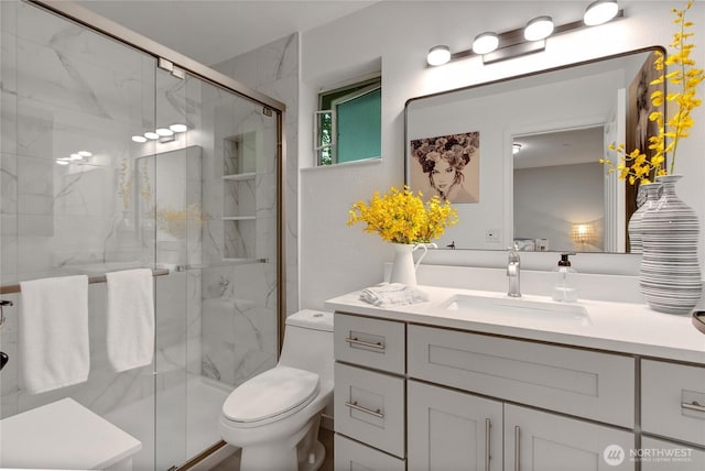 2300 Jefferson Ave NE Unit F-126, Renton, WA 98056 - bathroom featuring vanity and a marble finish shower