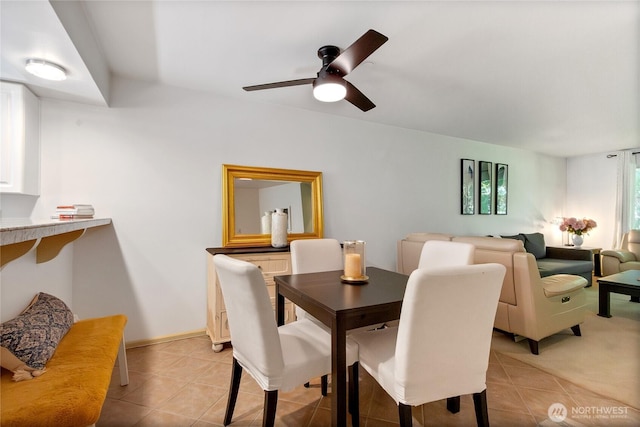 2300 Jefferson Ave NE Unit F-126, Renton, WA 98056 - dining room featuring light tile patterned flooring and ceiling fan