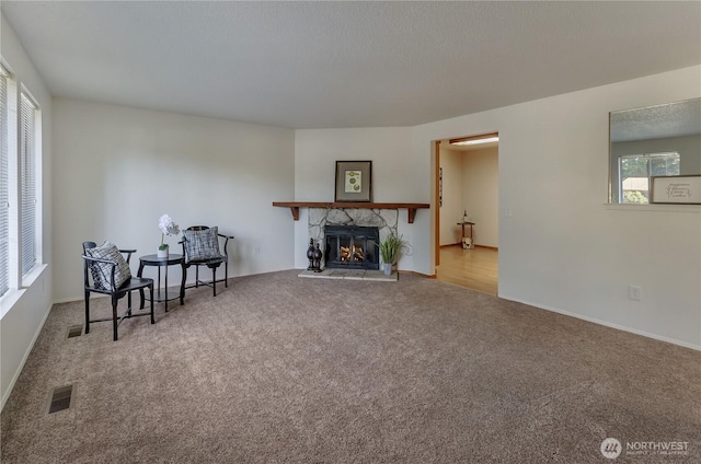 7127 Fair Oaks Loop SE, Olympia, WA 98513 - living area with carpet flooring and a fireplace