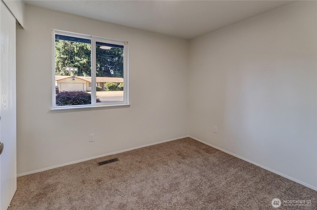 7127 Fair Oaks Loop SE, Olympia, WA 98513 - carpeted spare room featuring baseboards