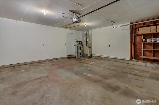 7127 Fair Oaks Loop SE, Olympia, WA 98513 - garage with a garage door opener and water heater