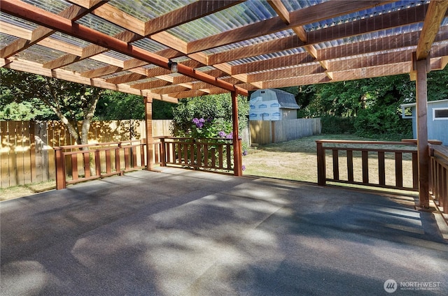 7127 Fair Oaks Loop SE, Olympia, WA 98513 - view of patio with a storage unit and a pergola