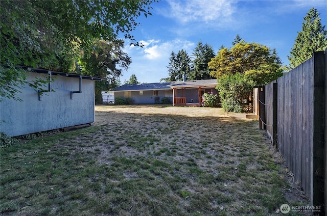 7127 Fair Oaks Loop SE, Olympia, WA 98513 - fenced backyard featuring an outdoor structure