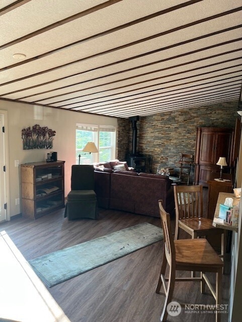 20011 Tveit Rd, Arlington, WA 98223 - living area with wood finished floors and a wood stove