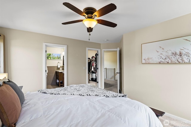 5115 150th St SE, Everett, WA 98208 - carpeted bedroom with ceiling fan, a walk in closet, and ensuite bath