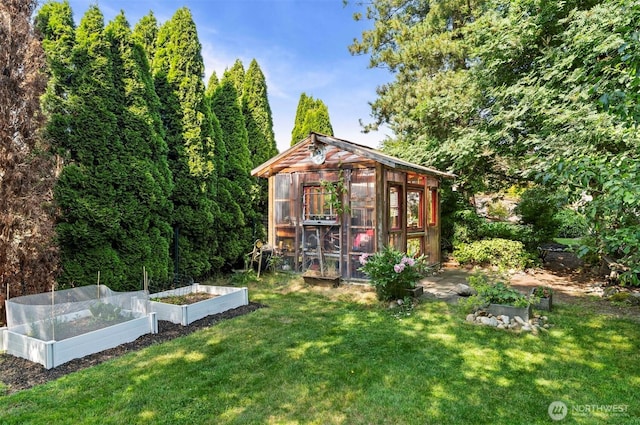 5115 150th St SE, Everett, WA 98208 - view of greenhouse featuring a garden and a yard