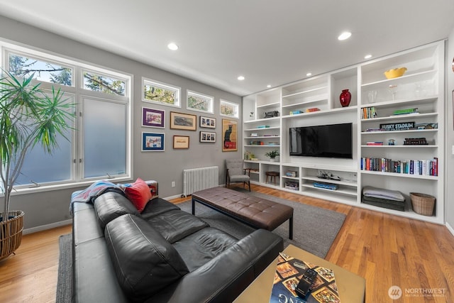 3516 NE 43rd St, Seattle, WA 98105 - living room with radiator, light wood-style floors, plenty of natural light, and recessed lighting