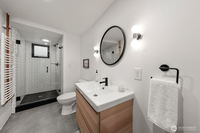 3516 NE 43rd St, Seattle, WA 98105 - bathroom with a shower stall, vanity, radiator, and a towel warmer
