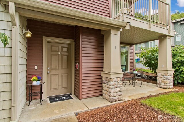 15325 SE 155th Pl Unit K1, Renton, WA 98058 - property entrance featuring covered porch and a balcony