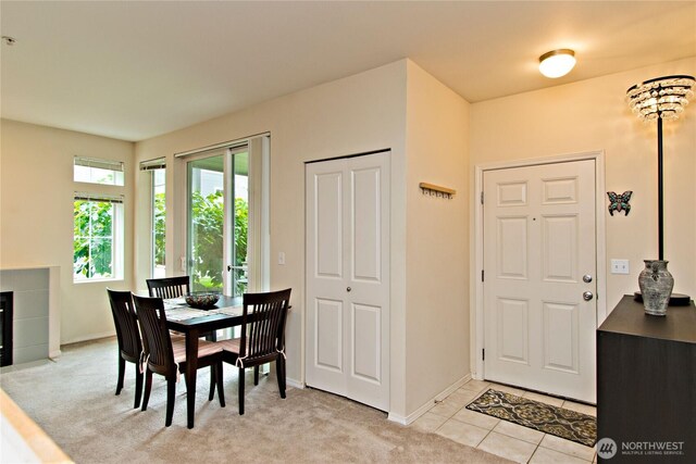 15325 SE 155th Pl Unit K1, Renton, WA 98058 - dining area with light carpet and light tile patterned flooring
