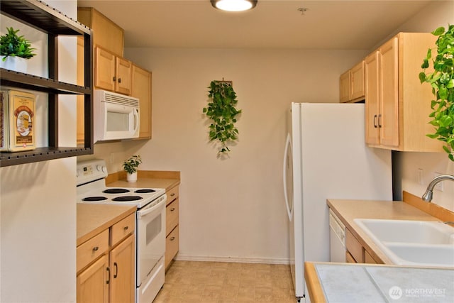 15325 SE 155th Pl Unit K1, Renton, WA 98058 - kitchen featuring white appliances, light brown cabinets, and light countertops