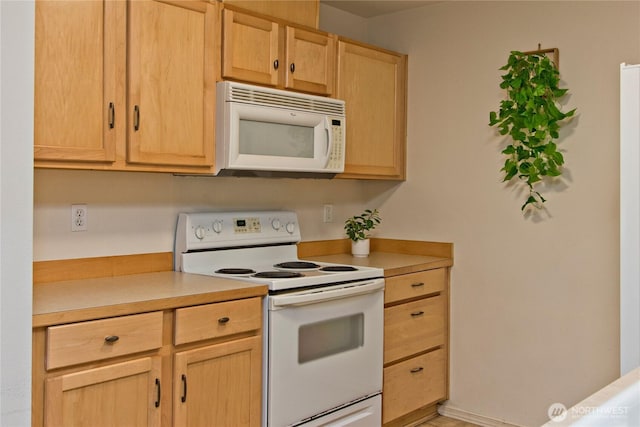 15325 SE 155th Pl Unit K1, Renton, WA 98058 - kitchen featuring white appliances, light brown cabinets, and light countertops