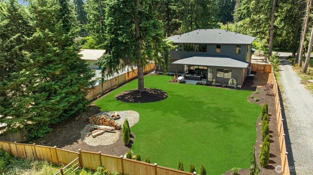 16429 Snohomish Ave SE, Clearview, WA 98296 - fenced backyard featuring a patio area