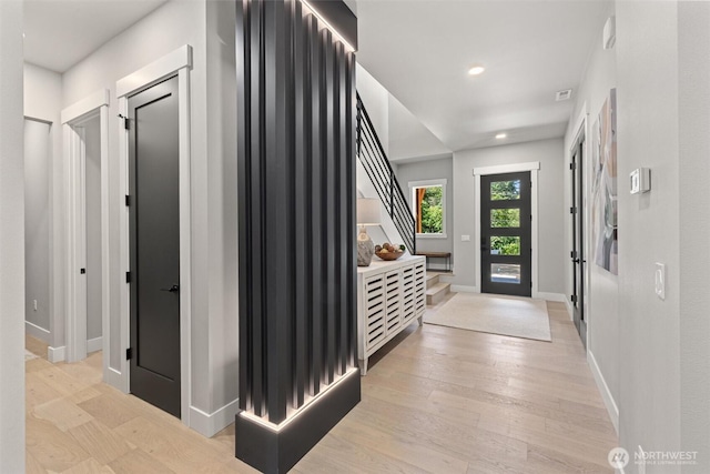16429 Snohomish Ave SE, Clearview, WA 98296 - foyer entrance with light wood-style floors, stairway, and recessed lighting