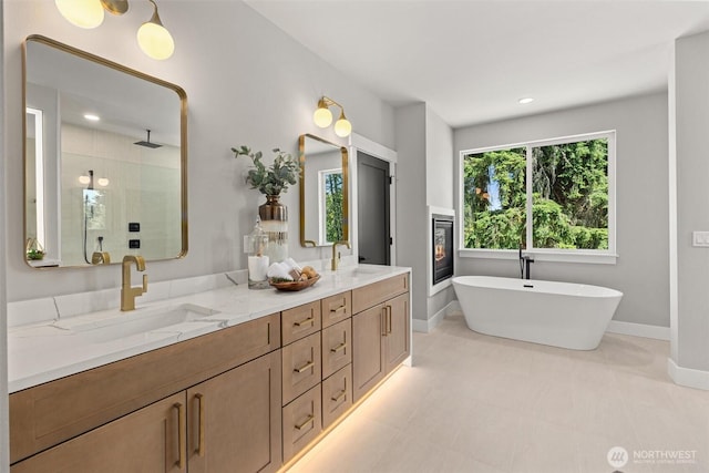 16429 Snohomish Ave SE, Clearview, WA 98296 - bathroom featuring double vanity, a stall shower, a soaking tub, and recessed lighting