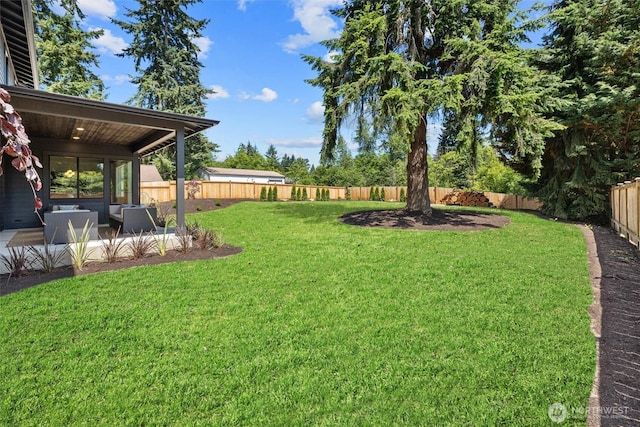 16429 Snohomish Ave SE, Clearview, WA 98296 - fenced backyard with an outdoor living space