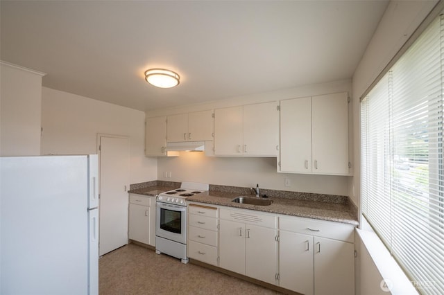 3469 6th Ave W, Seattle, WA 98119 - kitchen with white appliances, under cabinet range hood, and white cabinetry
