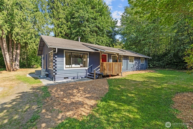8618 212th St NE, Arlington, WA 98223 - view of front facade with a front yard and log siding
