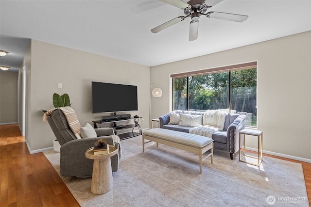 8618 212th St NE, Arlington, WA 98223 - living room featuring wood finished floors and ceiling fan