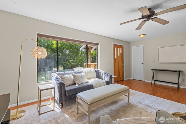 8618 212th St NE, Arlington, WA 98223 - living room featuring wood finished floors and a ceiling fan