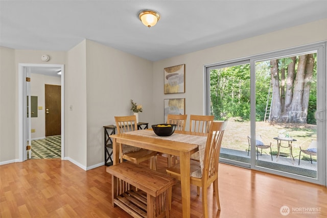 8618 212th St NE, Arlington, WA 98223 - dining space featuring light wood-style floors and baseboards
