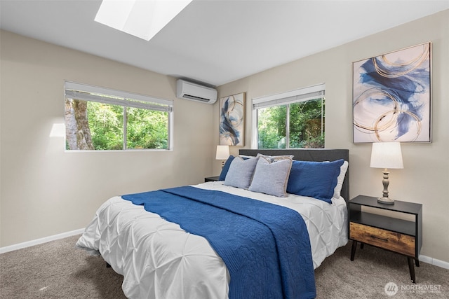 8618 212th St NE, Arlington, WA 98223 - bedroom featuring an AC wall unit, a skylight, multiple windows, and carpet floors